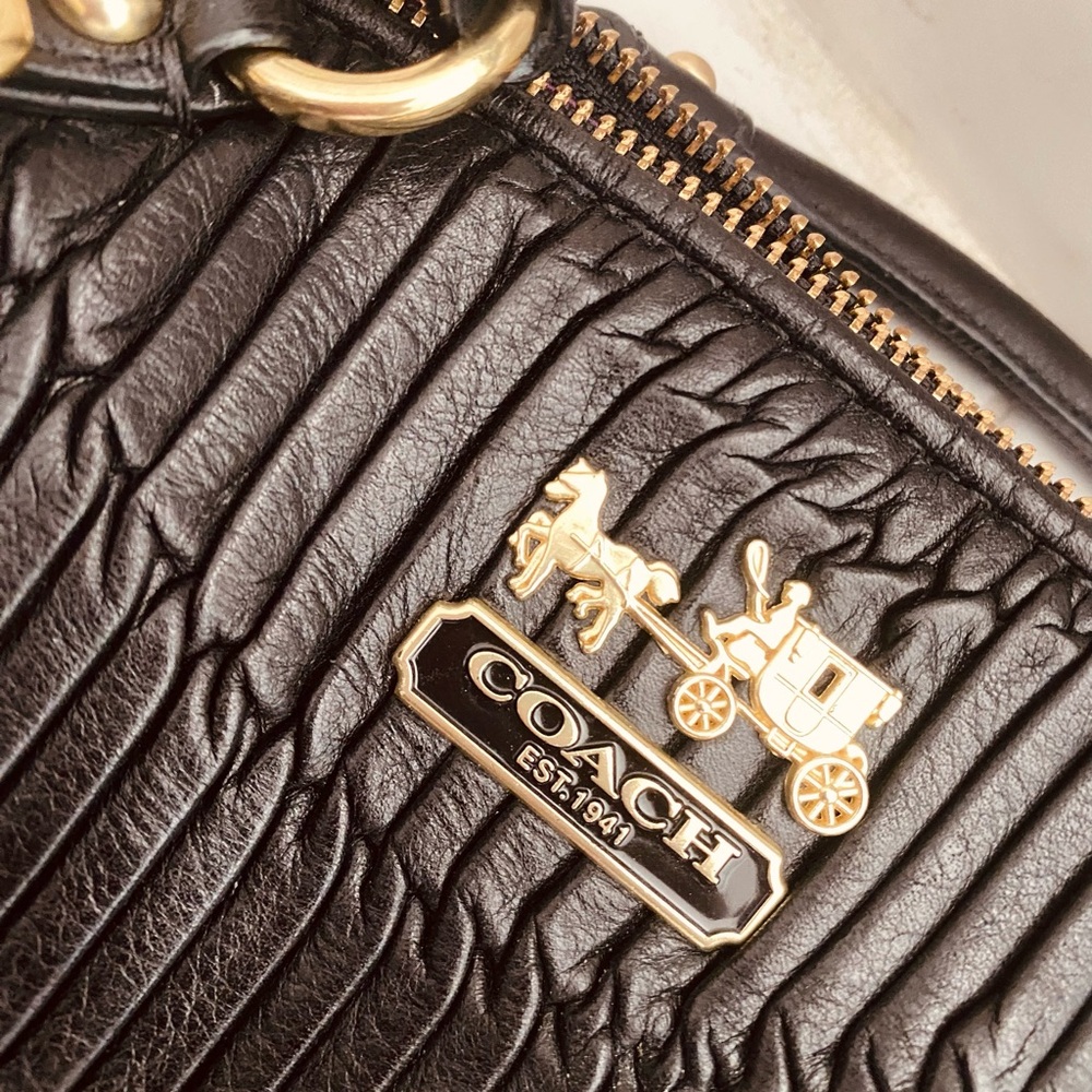 Coach Black Clutch with Gold Hardware and Quilted Design